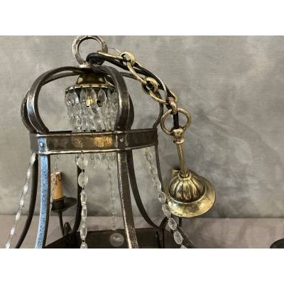 Antique chandelier in iron and period crystal garlands, late 19th century