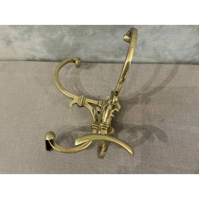 Antique double coat rack in polished and varnished brass, 19th century