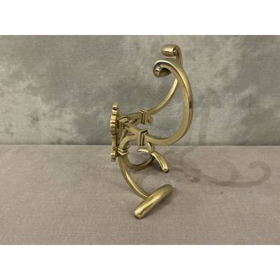 Antique double coat rack in polished and varnished brass, 19th century