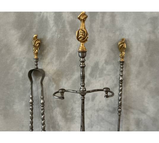 Serviteur de cheminée ancien en fer et bronze doré d'époque 19 ème