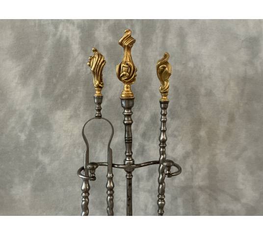 Antique 19th-century iron and gilt bronze fireplace set