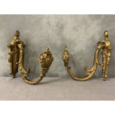 Pair of Louis XVI style gilt bronze door tiebacks from the 19th century