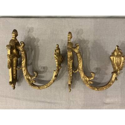 Pair of Louis XVI style gilt bronze door tiebacks from the 19th century