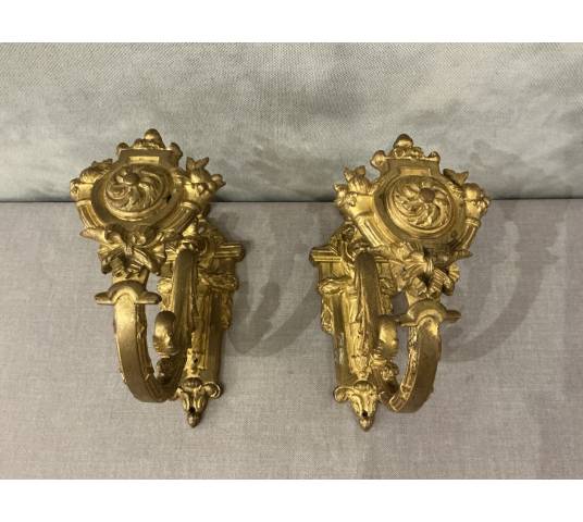 Pair of Louis XVI style gilt bronze door tiebacks from the 19th century