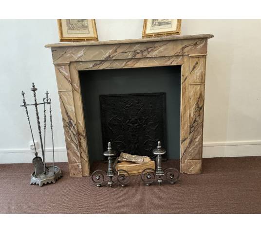 Decorative painted wooden fireplace from the late 19th century