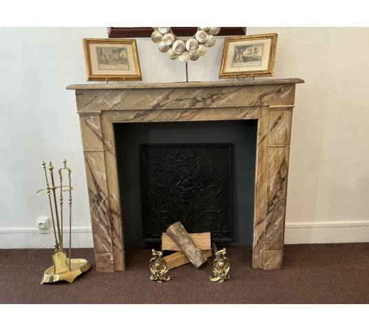 Decorative painted wooden fireplace from the late 19th century