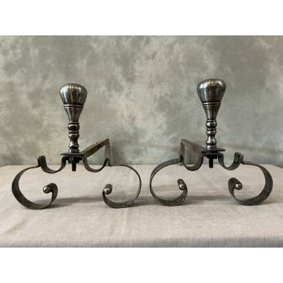 Pair of antique wrought iron andirons from the 18th century
