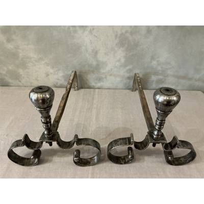 Pair of antique wrought iron andirons from the 18th century
