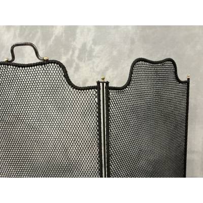 Antique blackened iron fireplace screen from the 19th century