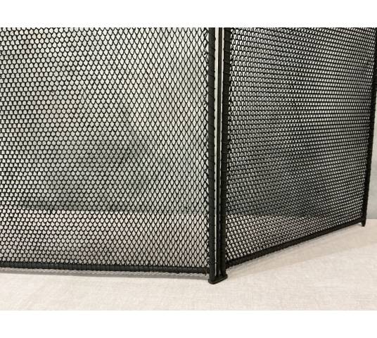 Antique blackened iron fireplace screen from the 19th century