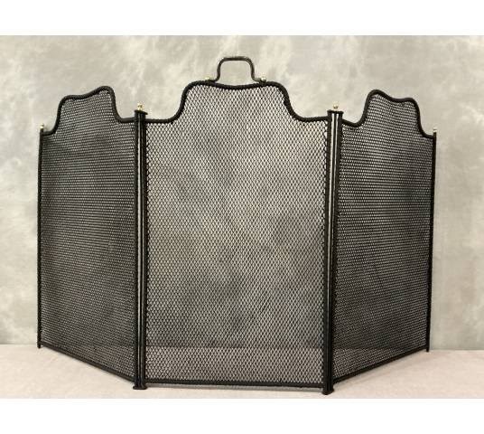 Antique blackened iron fireplace screen from the 19th century