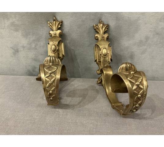 Pair of 19th-century matte bronze door tiebacks