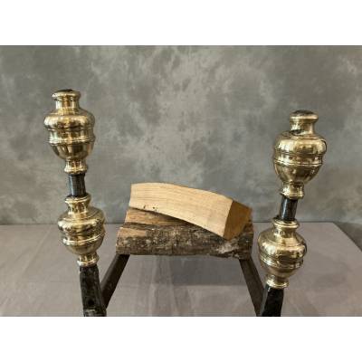 Pair of antique wrought iron and brass andirons dating from the 17th century