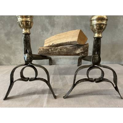 Pair of antique wrought iron and brass andirons dating from the 17th century