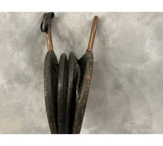 Antique rustic wooden fireplace bellows from the 18th century