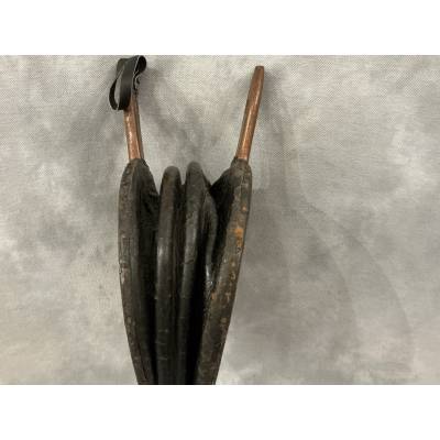 Antique rustic wooden fireplace bellows from the 18th century
