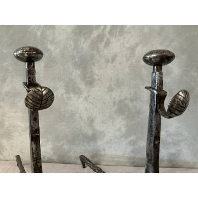 Pair of antique iron andirons from the 18th century
