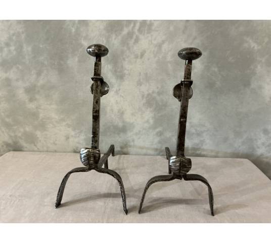 Pair of antique iron andirons from the 18th century