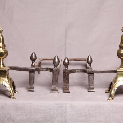 Pair of Louis XIV-era chenets in polished brass and iron