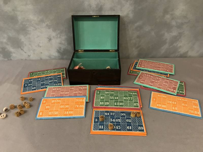 Old loto game circa 1900 in its mahogantly wooden box