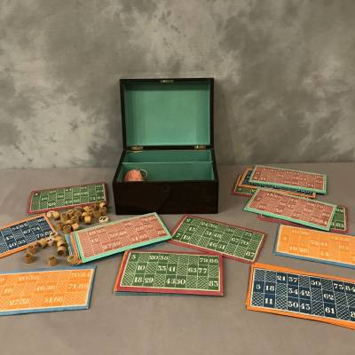 Old loto game circa 1900 in its mahogantly wooden box