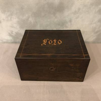 Old loto game circa 1900 in its mahogantly wooden box