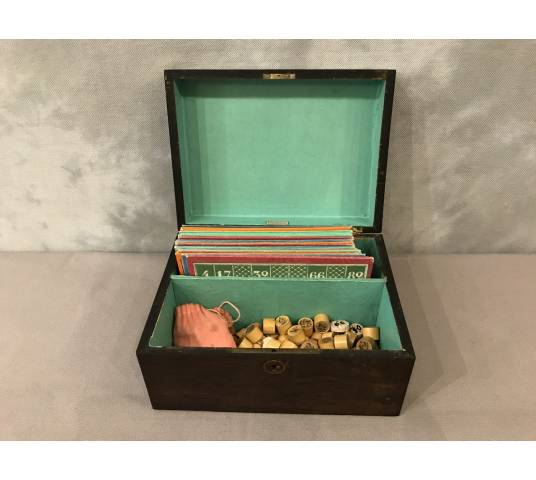 Old loto game circa 1900 in its mahogantly wooden box