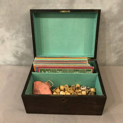 Old loto game circa 1900 in its mahogantly wooden box