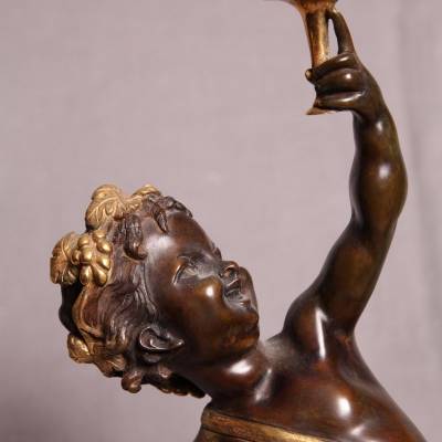 Belle paire puttis en  bronze doré et patiné représentant des Bacchus d'époque 19 ème