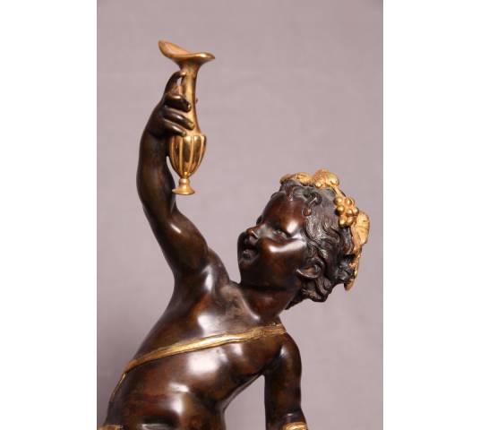 Belle paire puttis en  bronze doré et patiné représentant des Bacchus d'époque 19 ème