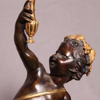 Belle paire puttis en  bronze doré et patiné représentant des Bacchus d'époque 19 ème