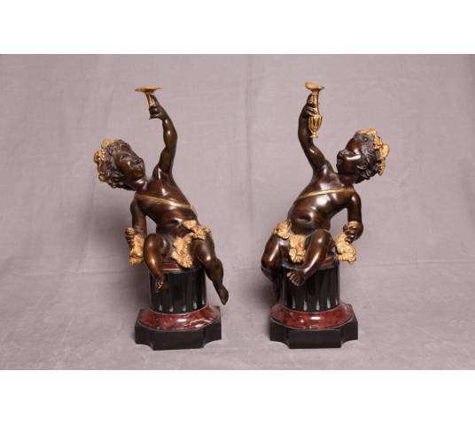 Belle paire puttis en  bronze doré et patiné représentant des Bacchus d'époque 19 ème