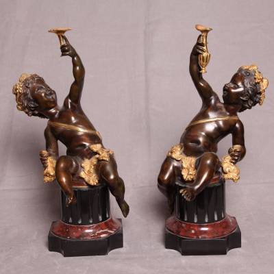 Belle paire puttis en  bronze doré et patiné représentant des Bacchus d'époque 19 ème