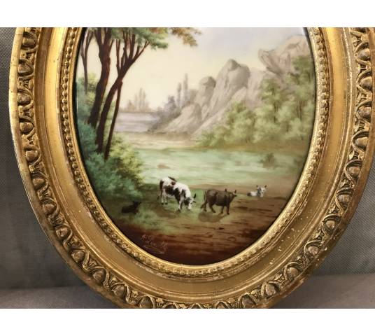 Paire de tableaux médaillon en porcelaine d'époque 19 ème