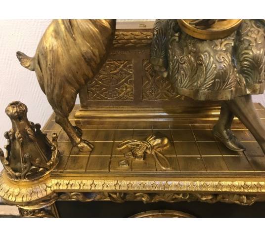 Bronze and marble pendulum in the decor of esmeralda and the period goat 19 th