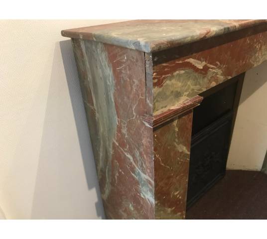 Decor of wood chimney in a fake vintage marble 19th century