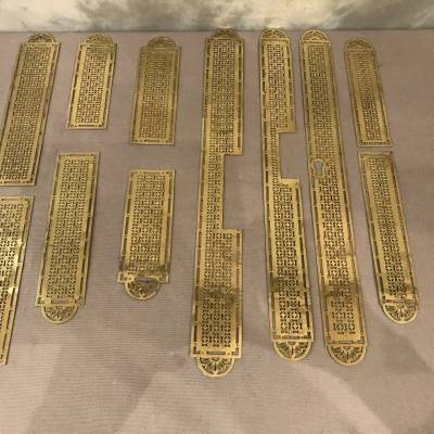 Set of 11 plates of cleanliness of period 19 th in brass