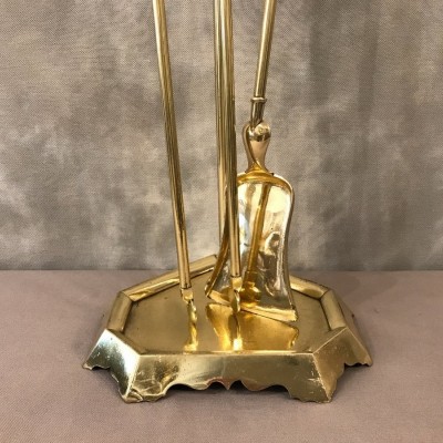 Servant of antique fireplace in polished brass of day 19 th