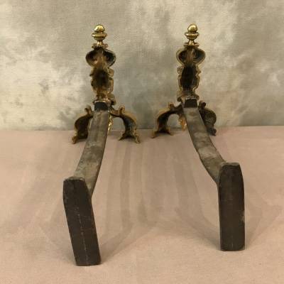 Paire de chenets anciens en bronze poli vers 1900