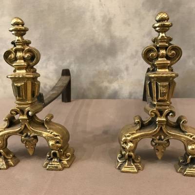 Paire de chenets anciens en bronze poli vers 1900