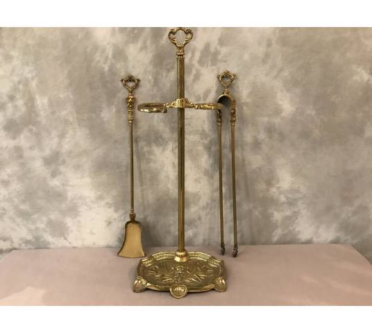 Servant of ancient fireplace in bronze and vintage brass - 19th century.