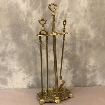 Servant of ancient fireplace in bronze and vintage brass - 19th century.