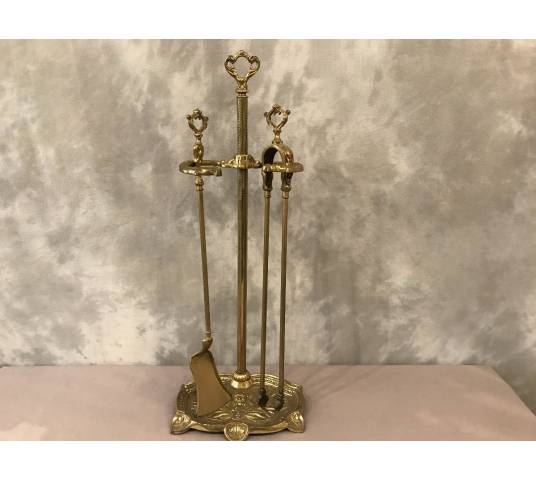 Servant of ancient fireplace in bronze and vintage brass - 19th century.