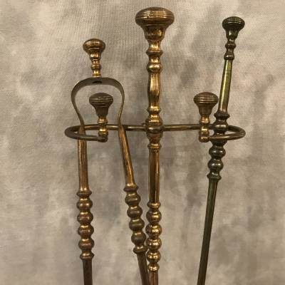 Serviteur de cheminée ancien en fer doré d'époque 19 ème