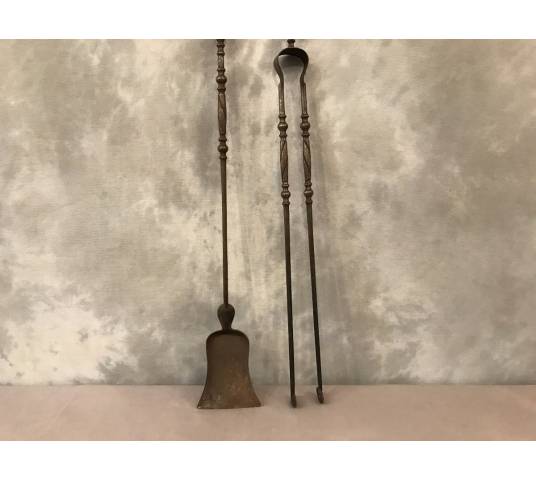 A shovel and an old iron fireplace and bronze epoch 19 th