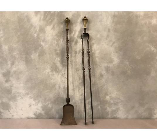 A shovel and an old iron fireplace and bronze epoch 19 th