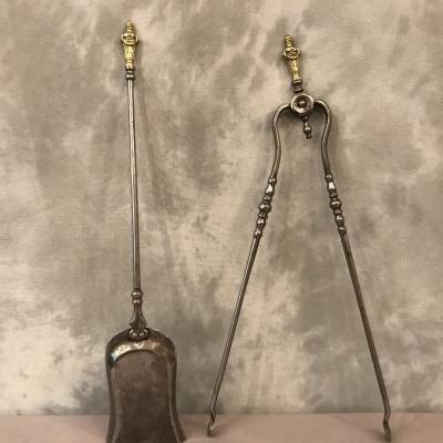 Set of a shovel and a pliers in iron and bronze from epoch 19th century