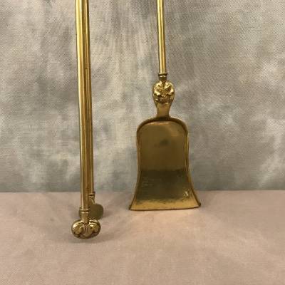 Ensemble d'une pelle et d'une pince de cheminée  en bronze et laiton d'époque 19 ème