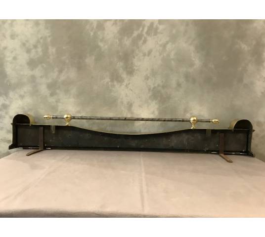 Beautiful and large chiselled bronze fireplace bar from early 19th century