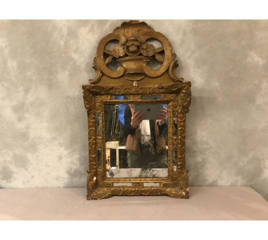 Beautiful mirror in gilded wood of the period 18 th Louis XV with its old ice